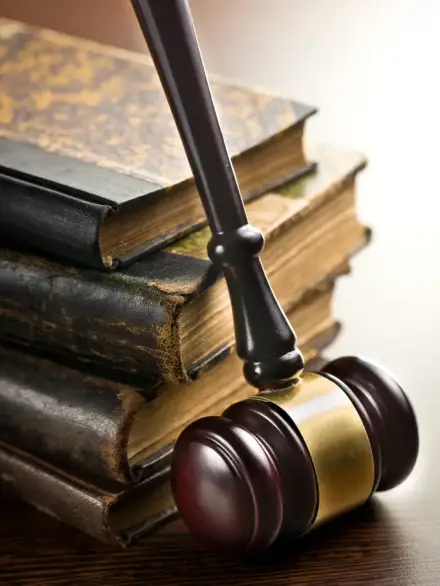 judge-gavel-with-old-books-2025-03-16-06-58-26-utc